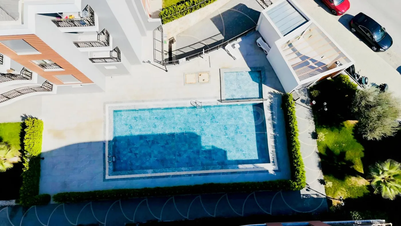 Kuşadası okullar bölgesinde geniş bahçe paylı 2+1