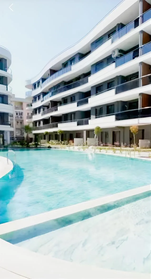 KUŞADASI MERKEZDE D.GAZLI YENİ SİTEDE SATILIK 2+1 DAİRE