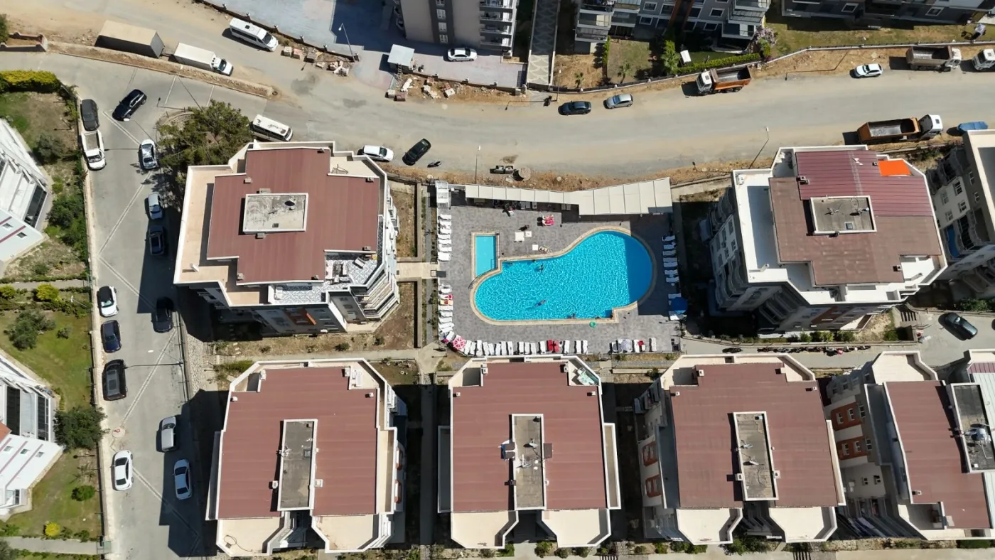 Kuşadası Havuzlu Site İçerisinde Deniz Manzaralı Satılık Daire