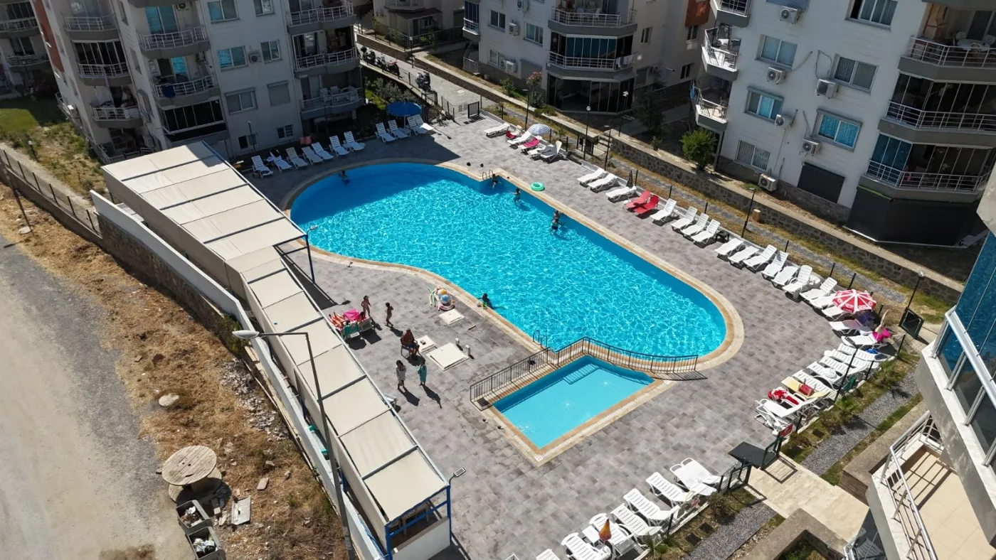 Kuşadası Havuzlu Site İçerisinde Deniz Manzaralı Satılık Daire