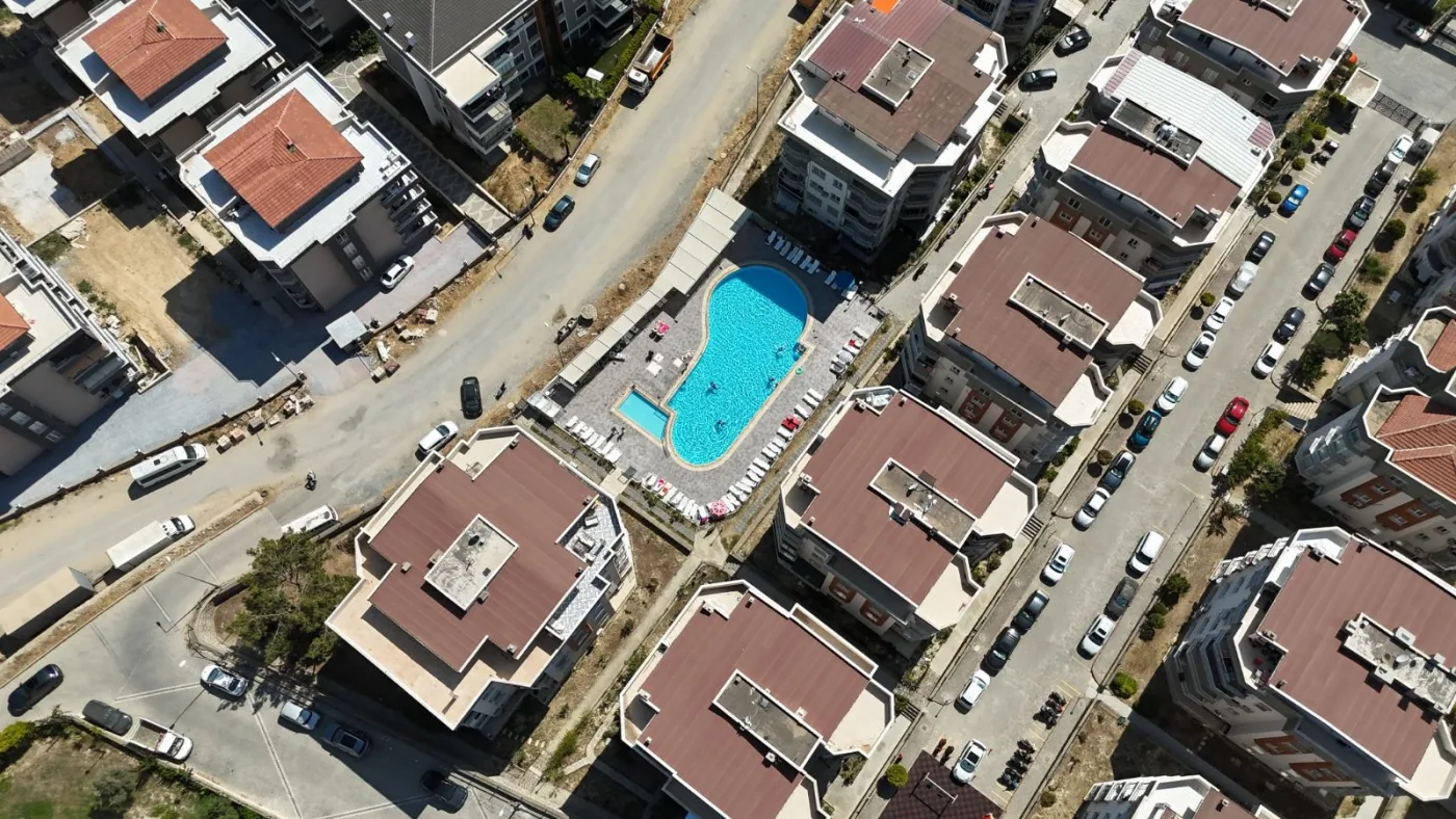 Kuşadası Havuzlu Site İçerisinde Deniz Manzaralı Satılık Daire