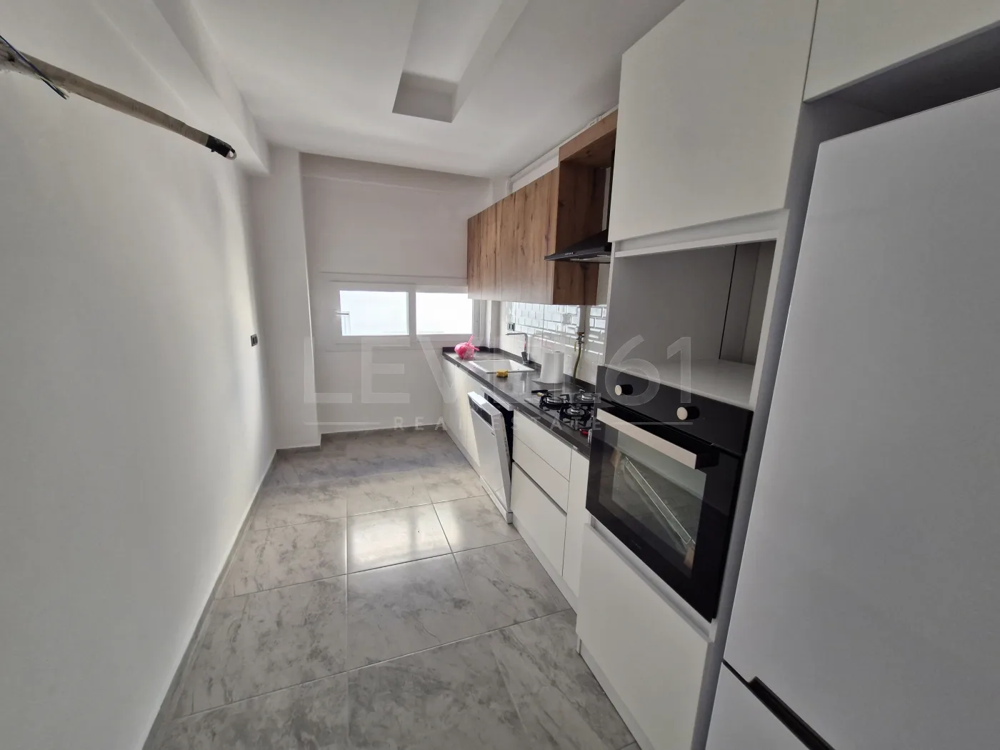Kuşadası Yeni İkiçeşmelik Satılık Kapalı Mutfak 3+1 Daire