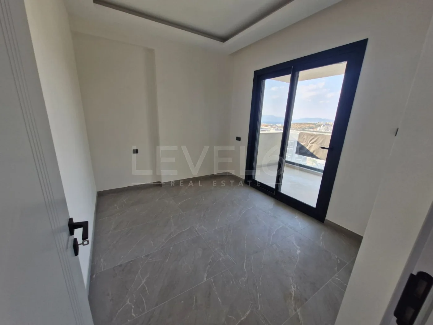 Kuşadası Değirmendere'de Satılık 2+1 Deniz Manzaralı Daire
