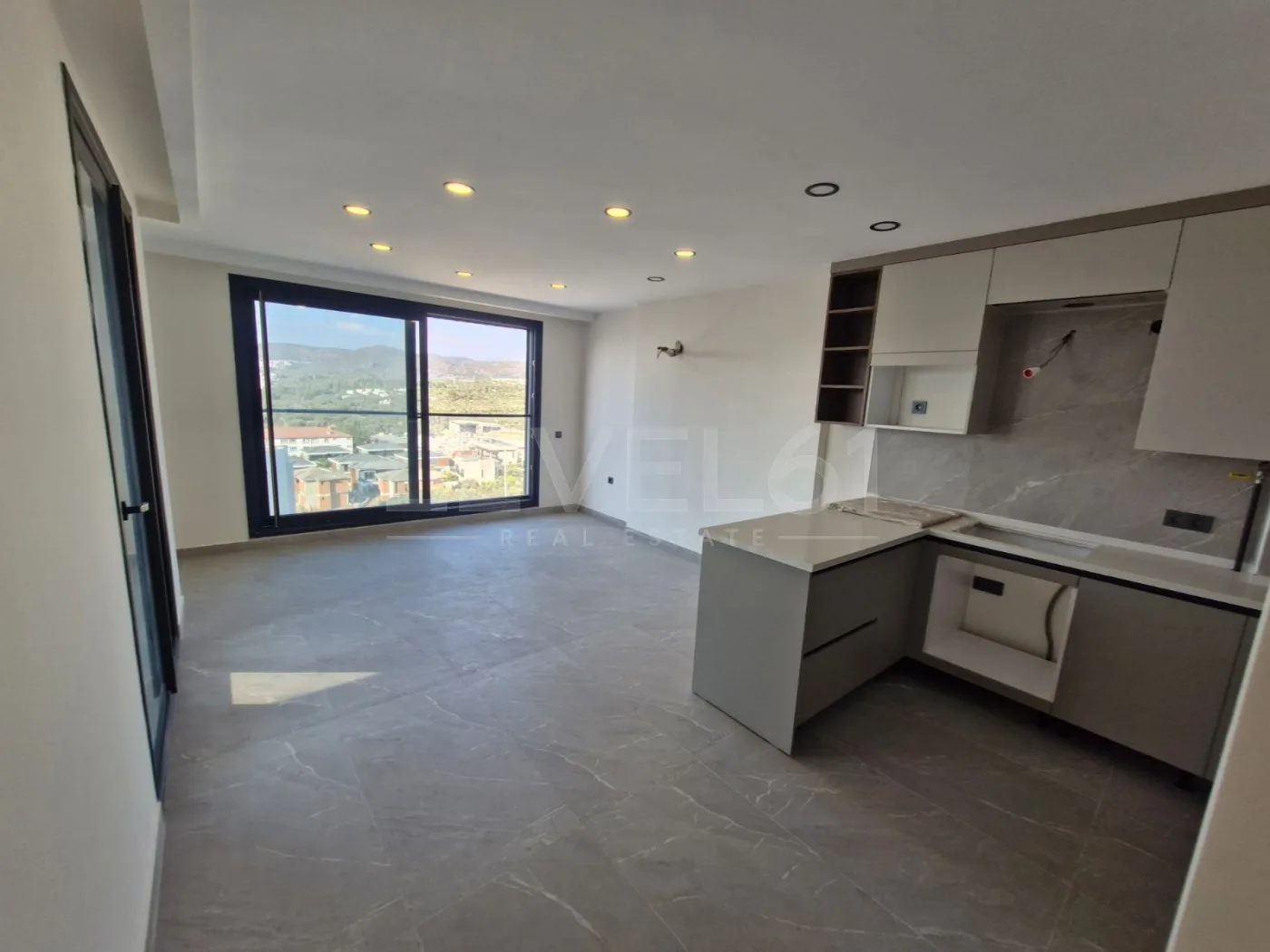 Kuşadası Değirmendere'de Satılık 2+1 Deniz Manzaralı Daire