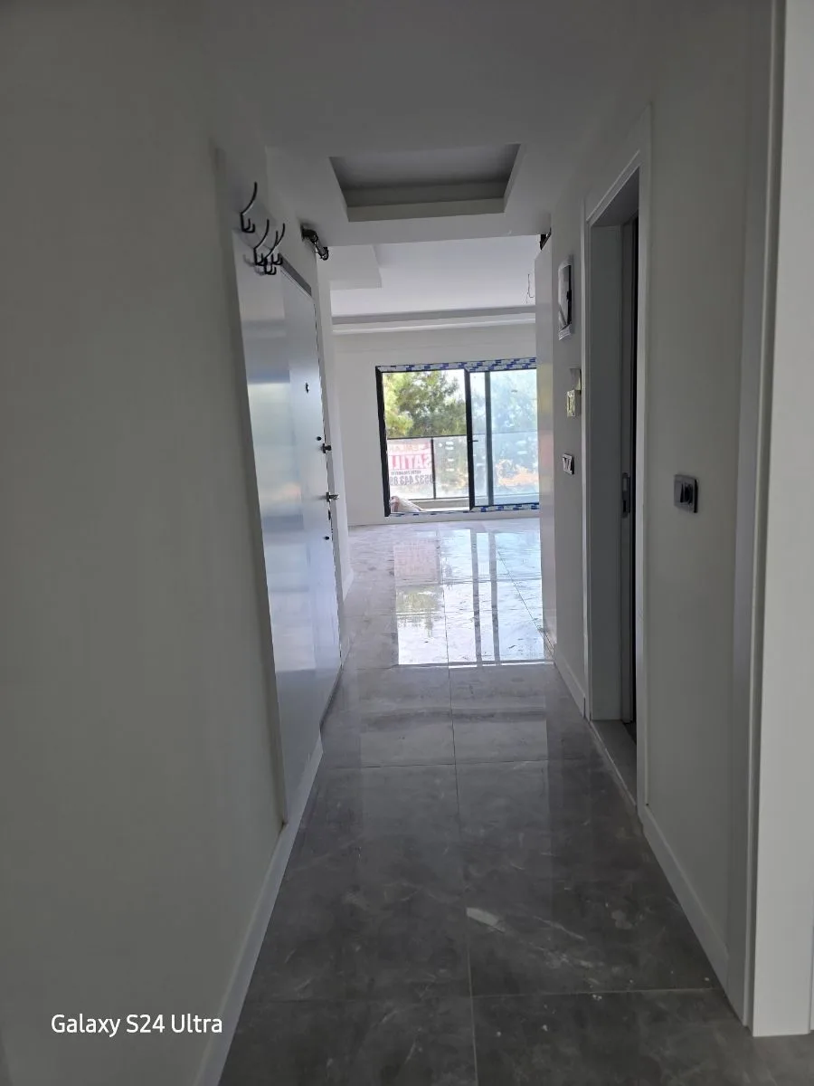 KUŞADASINDA DENİZ MANZARALI DOGAL ĞAZLI SATILIK 2+1DAİRE