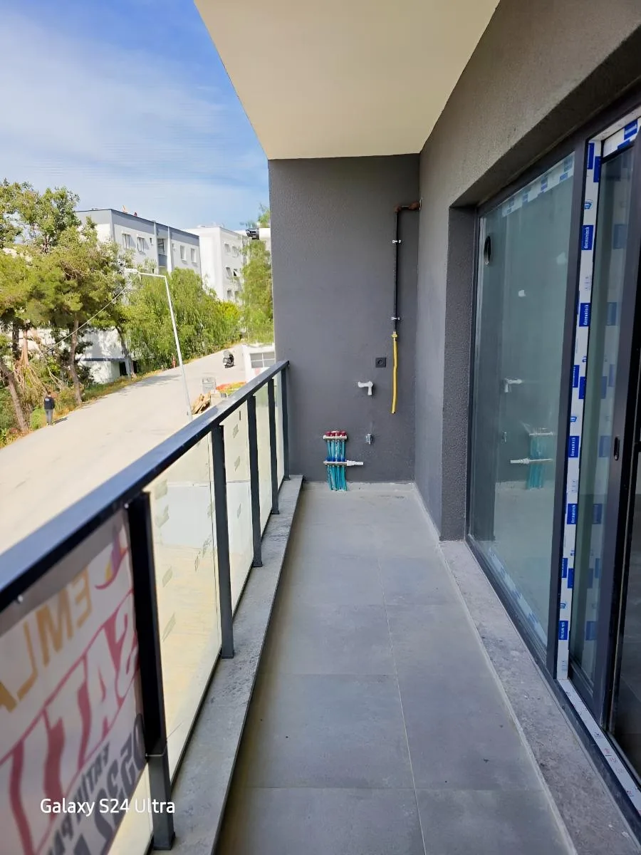 KUŞADASINDA DENİZ MANZARALI DOGAL ĞAZLI SATILIK 2+1DAİRE