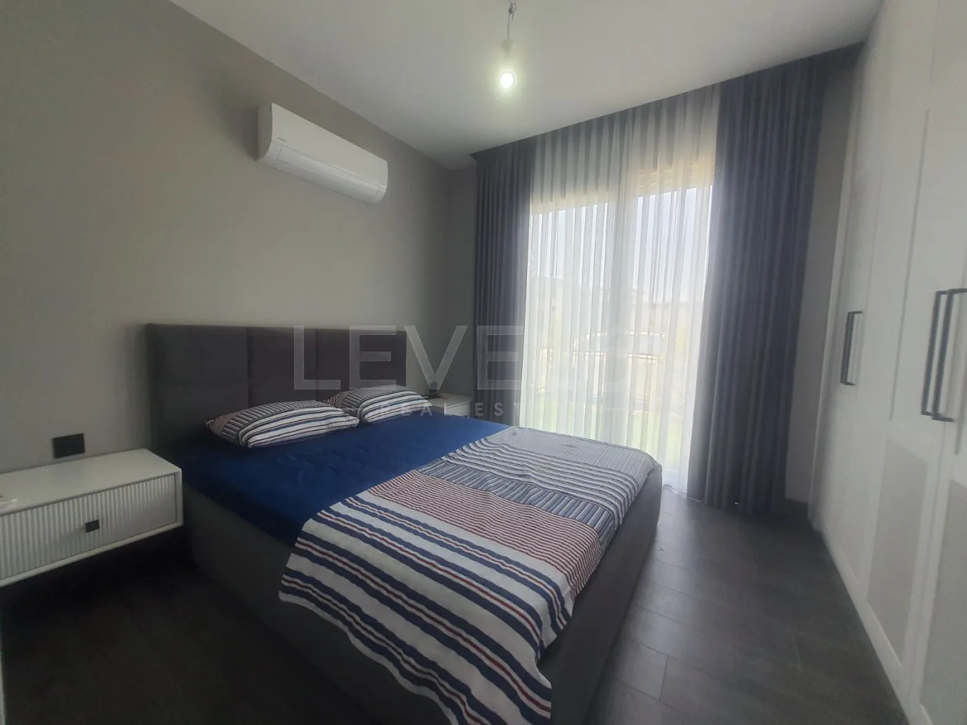 KUŞADASINDA TEK KATLI ÖZEL HAVUZLUELEKTİRİGİNİ ÜRETEN SATILIK 4+1 VİLLA